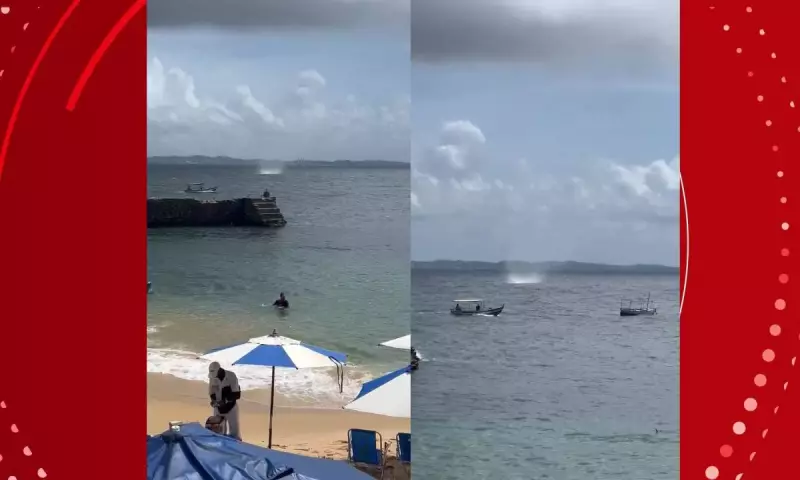Tromba d'água surpreende banhistas em praia de Salvador: veja imagens impressionantes