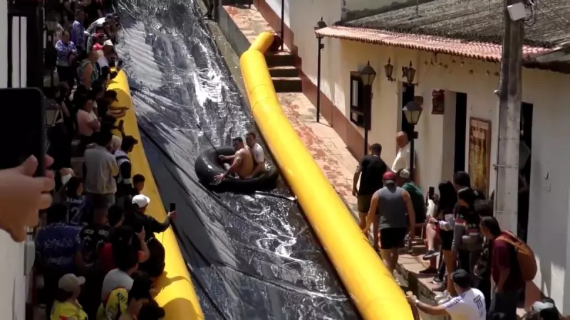 Cidade colombiana transforma ruas em parque de diversões com escorregador gigante