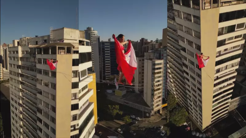 Atleta paraense desafia a gravidade a 200m de altura em Belo Horizonte com saia estampada de carimbos típicos