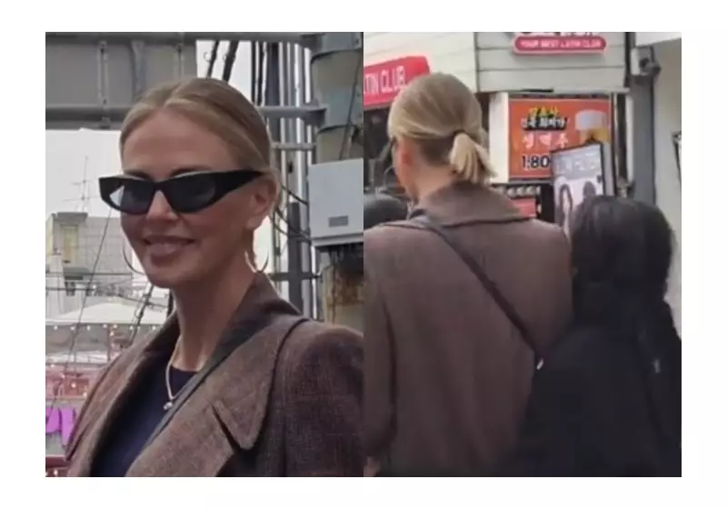 Charlize Theron surpreende fãs em visita anônima a bairro jovem de Seul