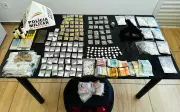 Motorista de app preso com drogas, R$ 9,6 mil e arma em MG
