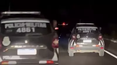 Policial usa lanterna para iluminar BR-020 após pane elétrica em viatura no Ceará