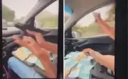 Jovem é preso em Goiás após postar vídeo atirando de carro e ostentando dinheiro