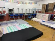 Escola em Juiz de Fora se torna abrigo após temporal, acolhendo famílias e animais