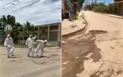 Moradores de Cabo Frio protestam com fantasias da Nasa contra buracos nas ruas