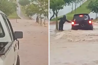 Motociclista agarra-se a poste para escapar de enxurrada em Nova Odessa; morador o resgata