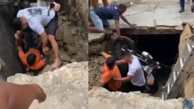 Motociclista e crianças caem em buraco após tampa de galeria ceder em Teresina