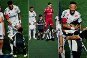 Menino de 6 anos viraliza ao beijar joelhos de Neymar antes de jogo do Santos