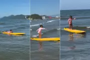 Mini surfista de 2 anos encanta ao pegar ondas em Santos e viraliza nas redes sociais