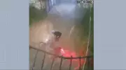Motociclista é arrastado por enxurrada em túnel de Betim durante temporal