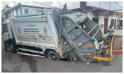 Caminhão de lixo cai em cratera no bairro Crespo, Zona Sul de Manaus