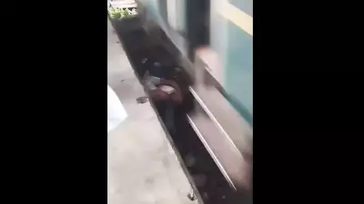 Pai pula nos trilhos para salvar bebê em Bangladesh e ambos escapam ilesos