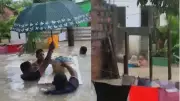 Família resgata bebê e criança em bacias durante inundação em Olinda