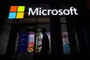 Microsoft avalia recuar de meta climática por demanda de energia de IA