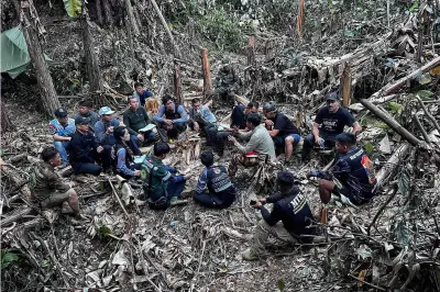 Busca por dois homens presos em caverna no Laos é suspensa