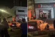 Carro pega fogo após colisão com poste em Guarujá; motorista ferido