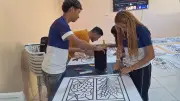 Fiéis mantêm tradição dos tapetes de Corpus Christi no Amazonas