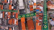 Moradores de Osasco pintam 38 bandeiras do Brasil em rua de 275 metros