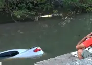 Mulher morre após carro cair no Rio Maracanã; filho dirigia