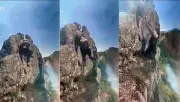 Mulher se desespera ao ver queda de homem em penhasco em Maricá