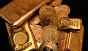 Ouro cai mais de 2% com petróleo e juros nos EUA; UBS vê recuperação