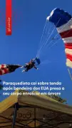 Paraquedista cai sobre tenda após bandeira dos EUA enroscar em árvore